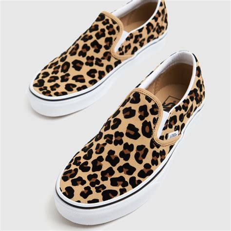 cheetah slip on vans.